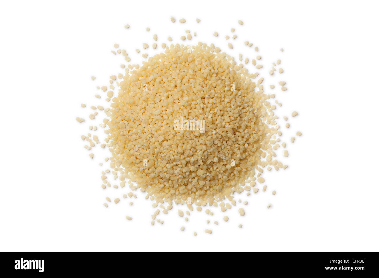 Heap of raw couscous grains on white background Stock Photo