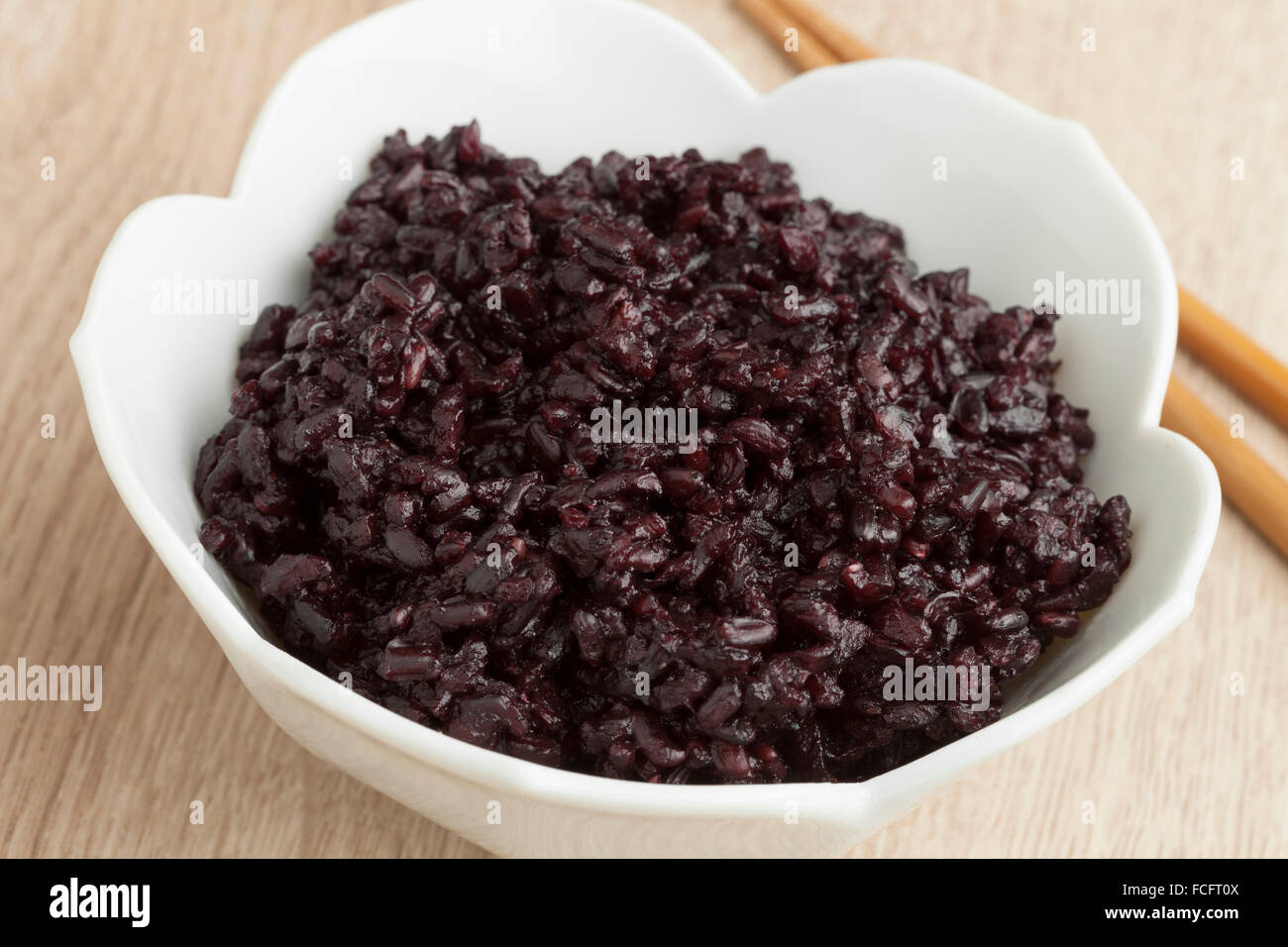 White bowl with black cooked rice Stock Photo