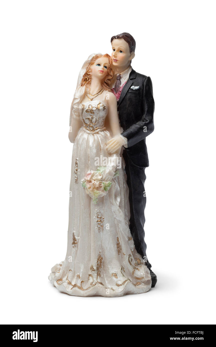 Old bride and groom cake topper on white background Stock Photo