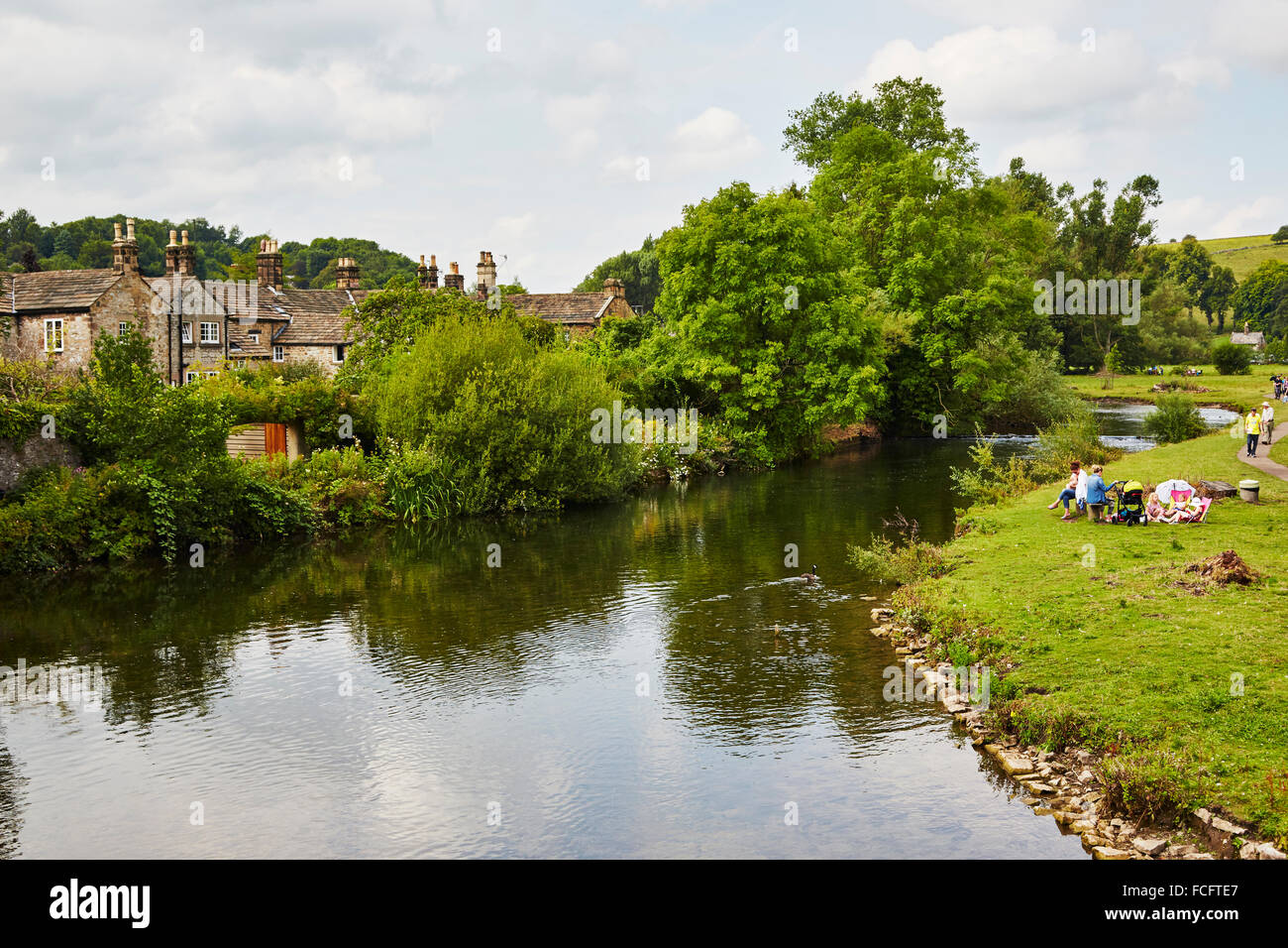 View of the River Wye from the old 13th century bridge in Bakewell, Derbyshire, England, UK. Stock Photo
