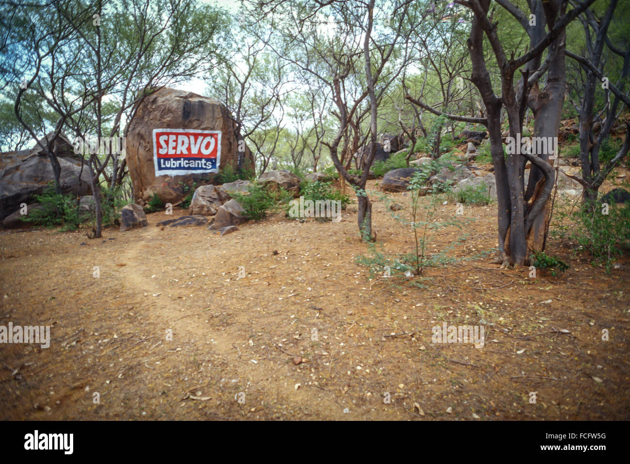 Advertising painted right onto the landscape in India. Stock Photo