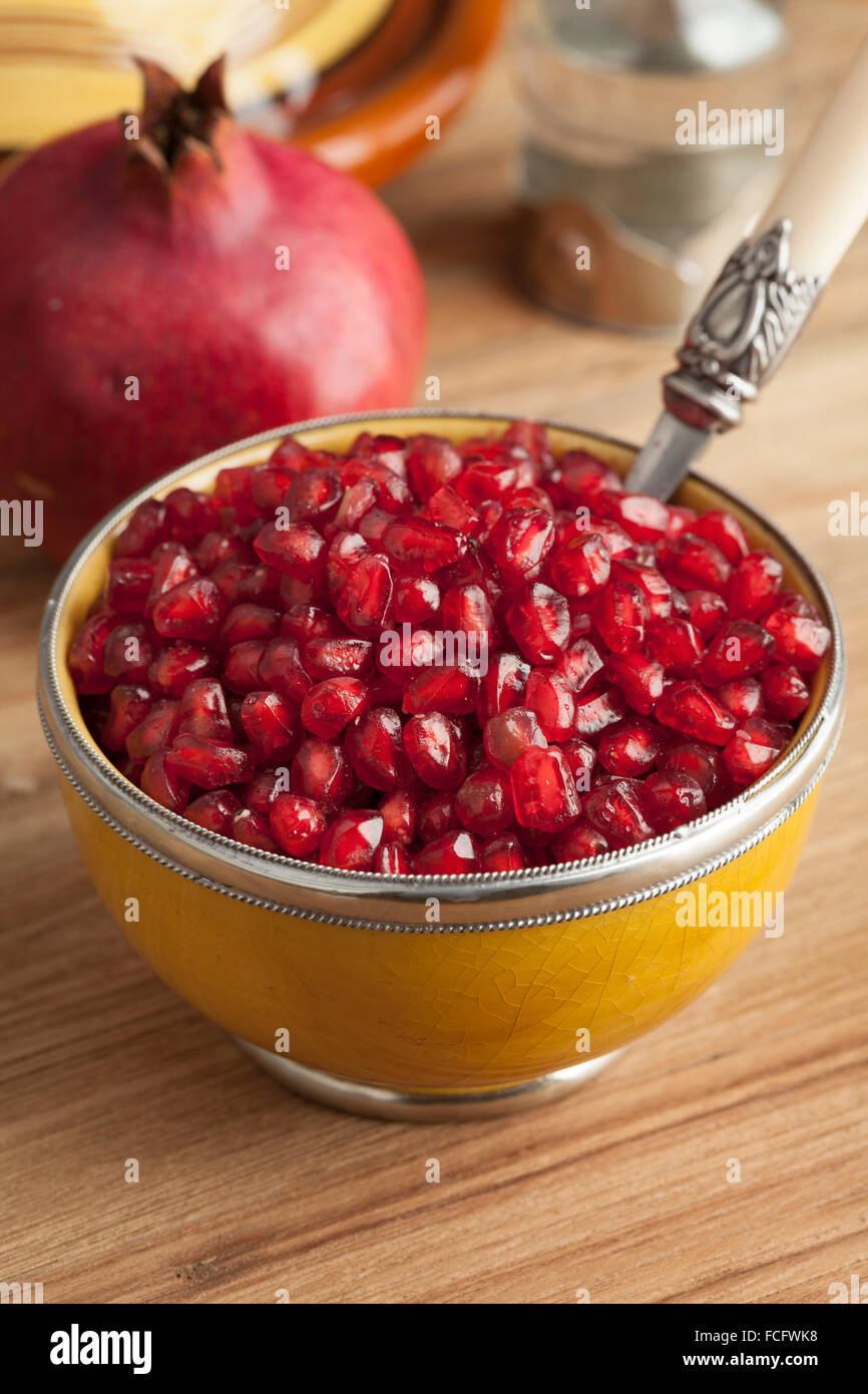 Moroccan dessert from fresh red pomegranate seeds Stock Photo