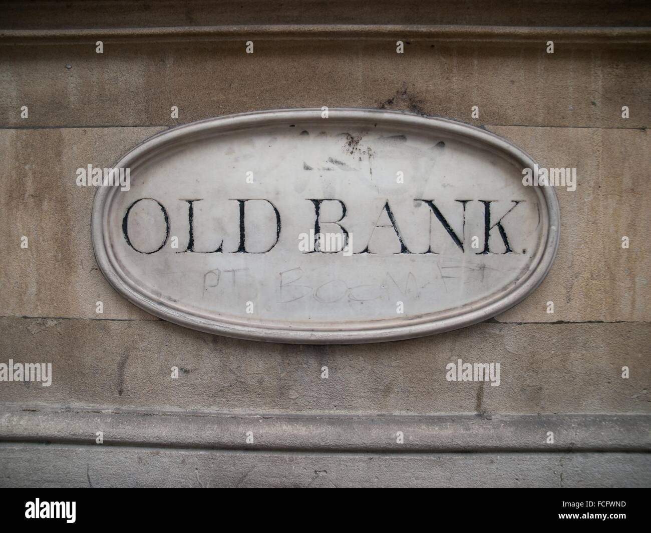 Old Bank Sign In Oval Shaped Marble On Stone Building In Bristol