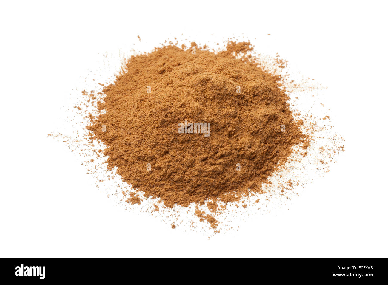 Heap of ground Cinnamon powder on white background Stock Photo