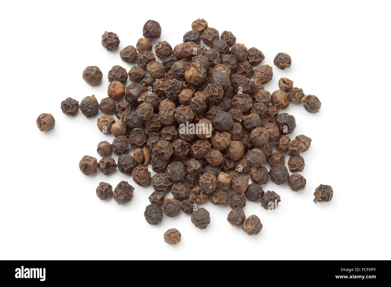 Heap of black peppercorns on white background Stock Photo