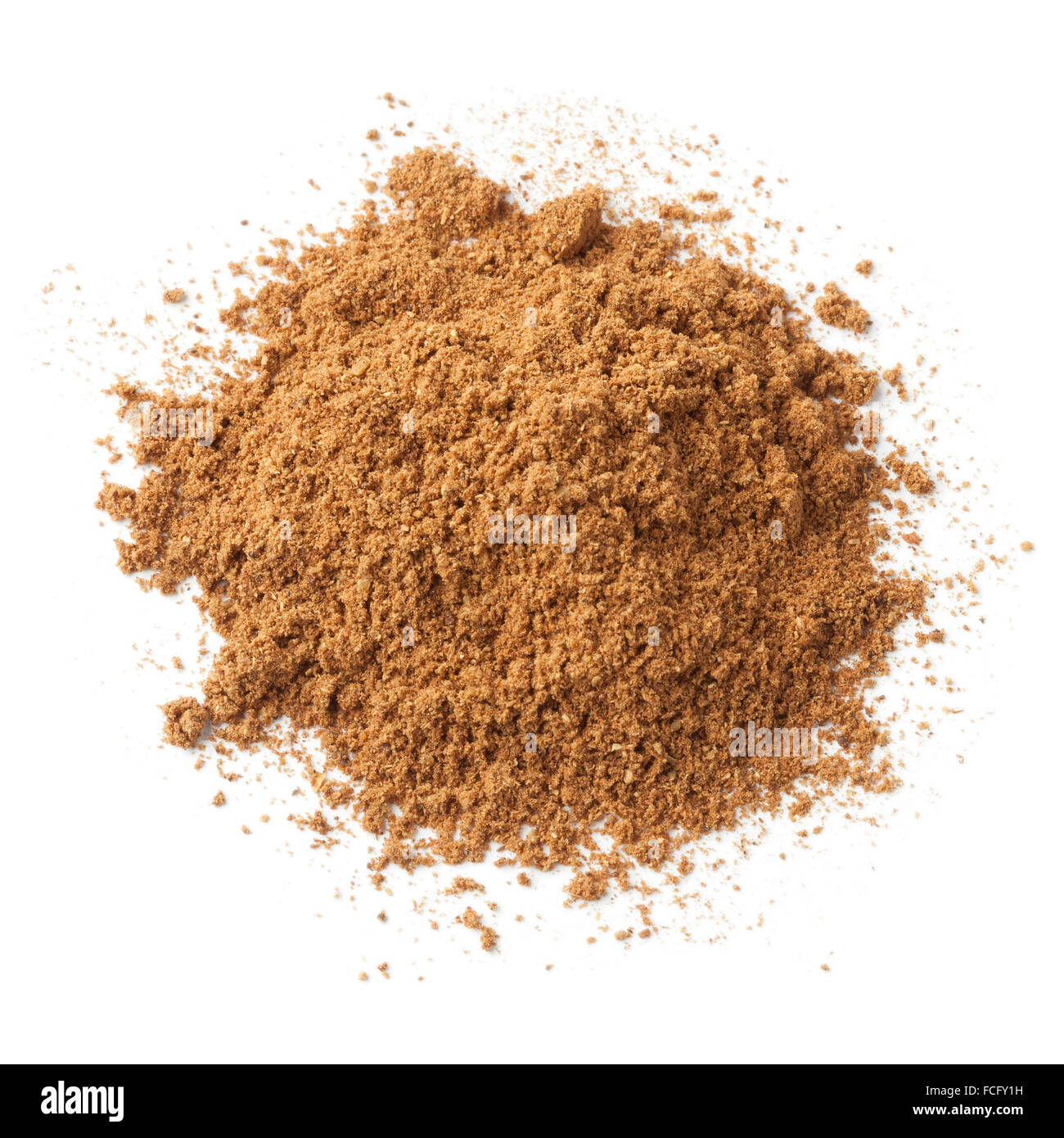 Heap of ground five-spice powder on white background Stock Photo