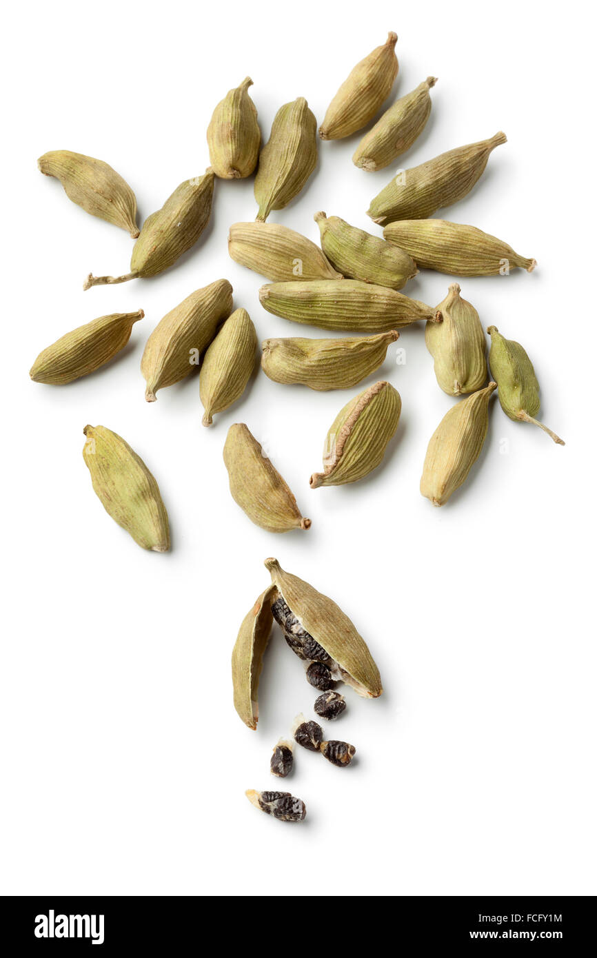 Green cardamom pods and seeds on white background Stock Photo