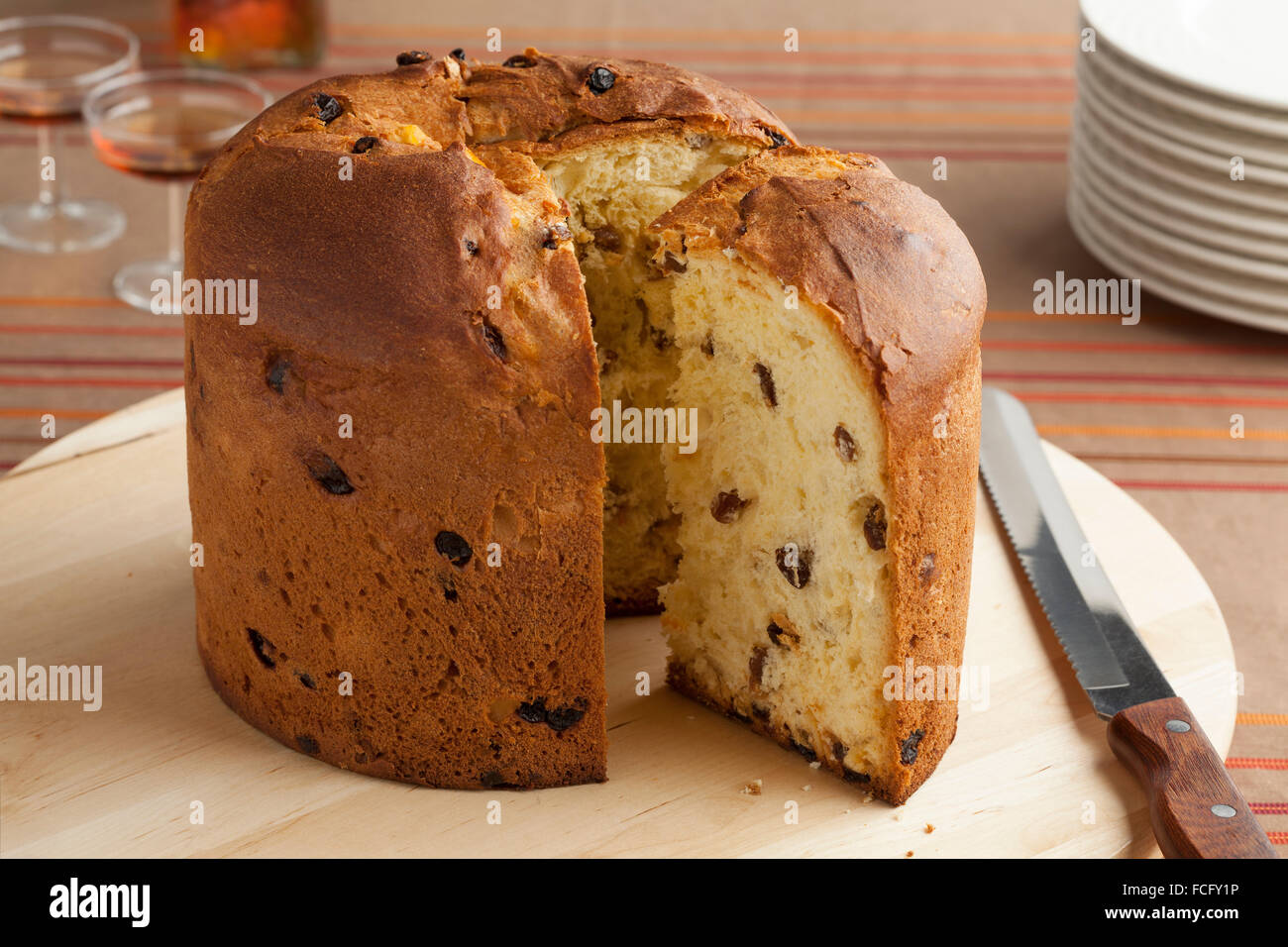 Traditional Italian panettone and a slice Stock Photo
