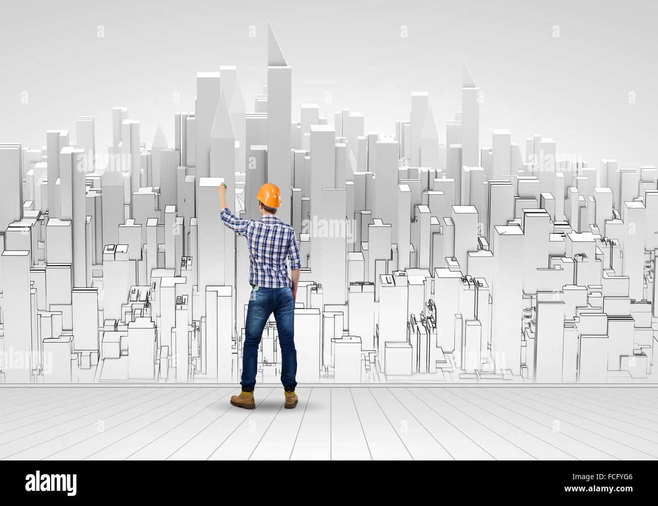 Rear view of engineer drawing project of business district Stock Photo ...