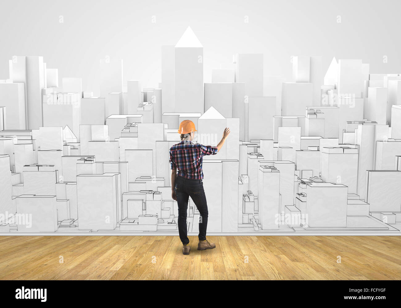 Rear view of engineer drawing project of business district Stock Photo ...