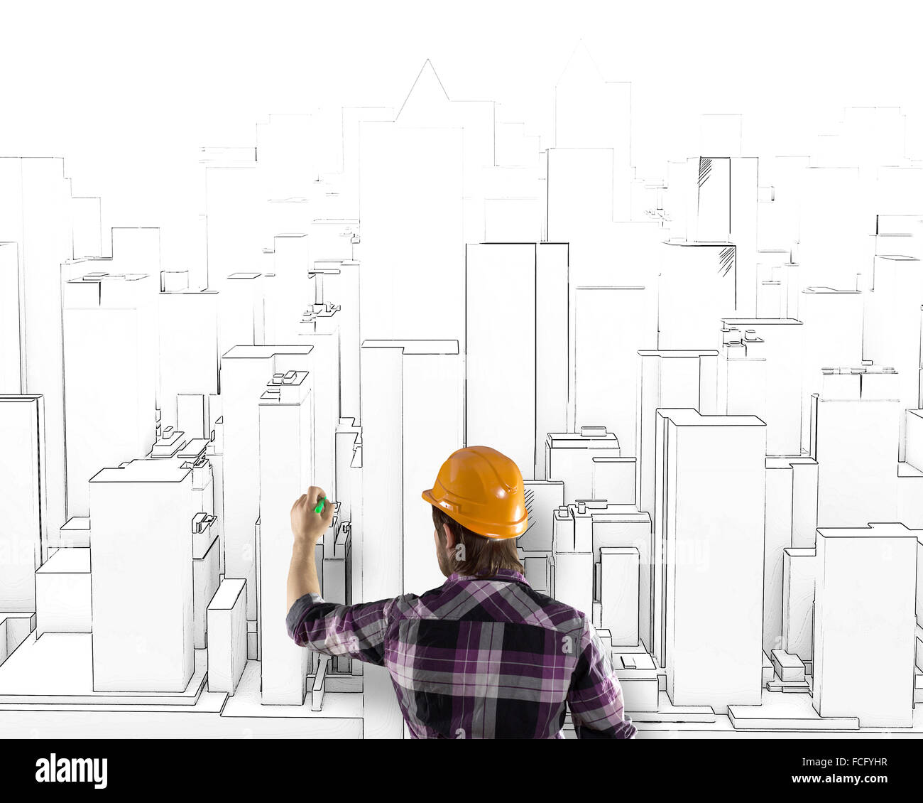 Rear view of engineer drawing project of business district Stock Photo ...