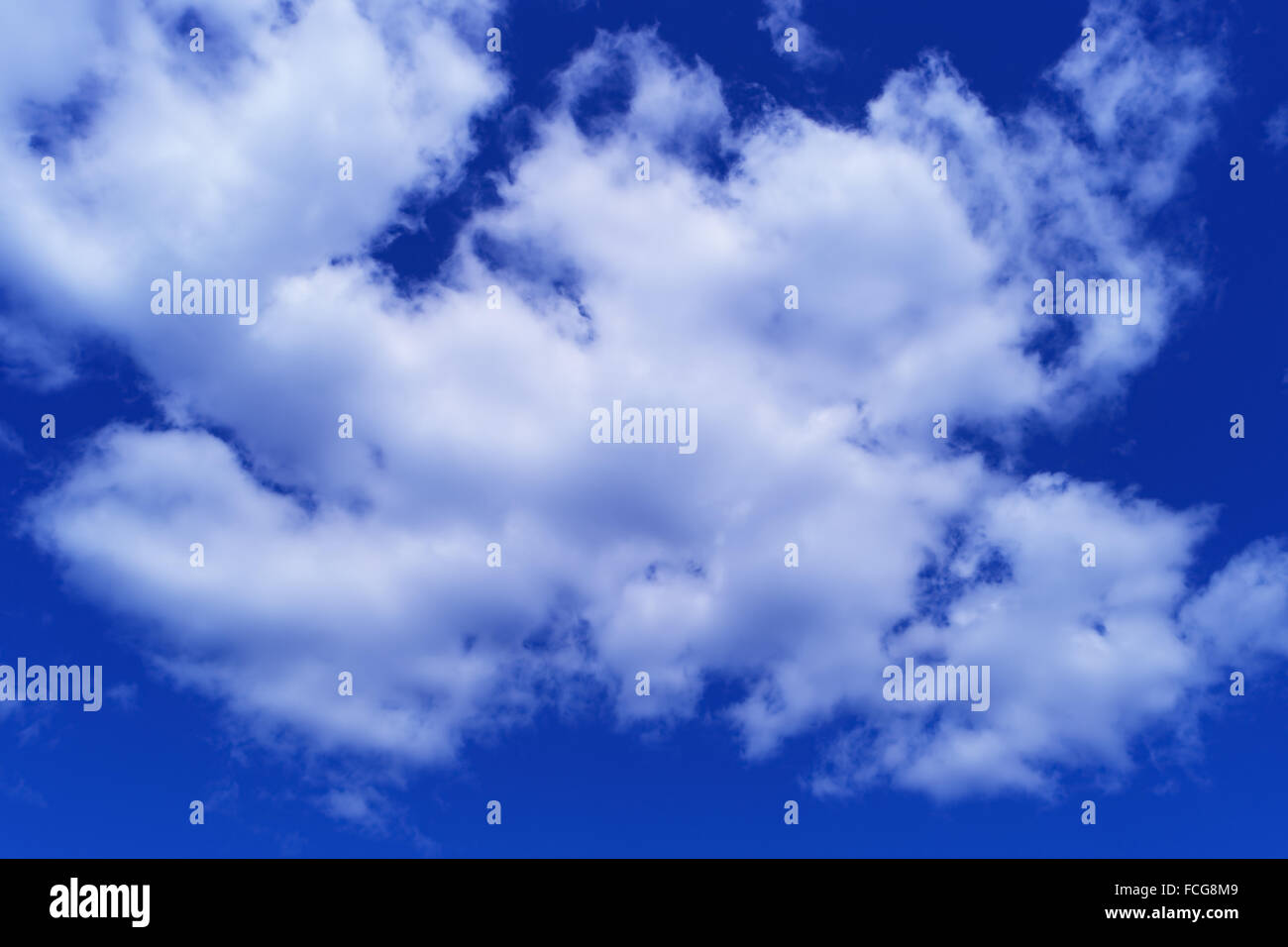 Beautiful white clouds on blue sky background Stock Photo - Alamy