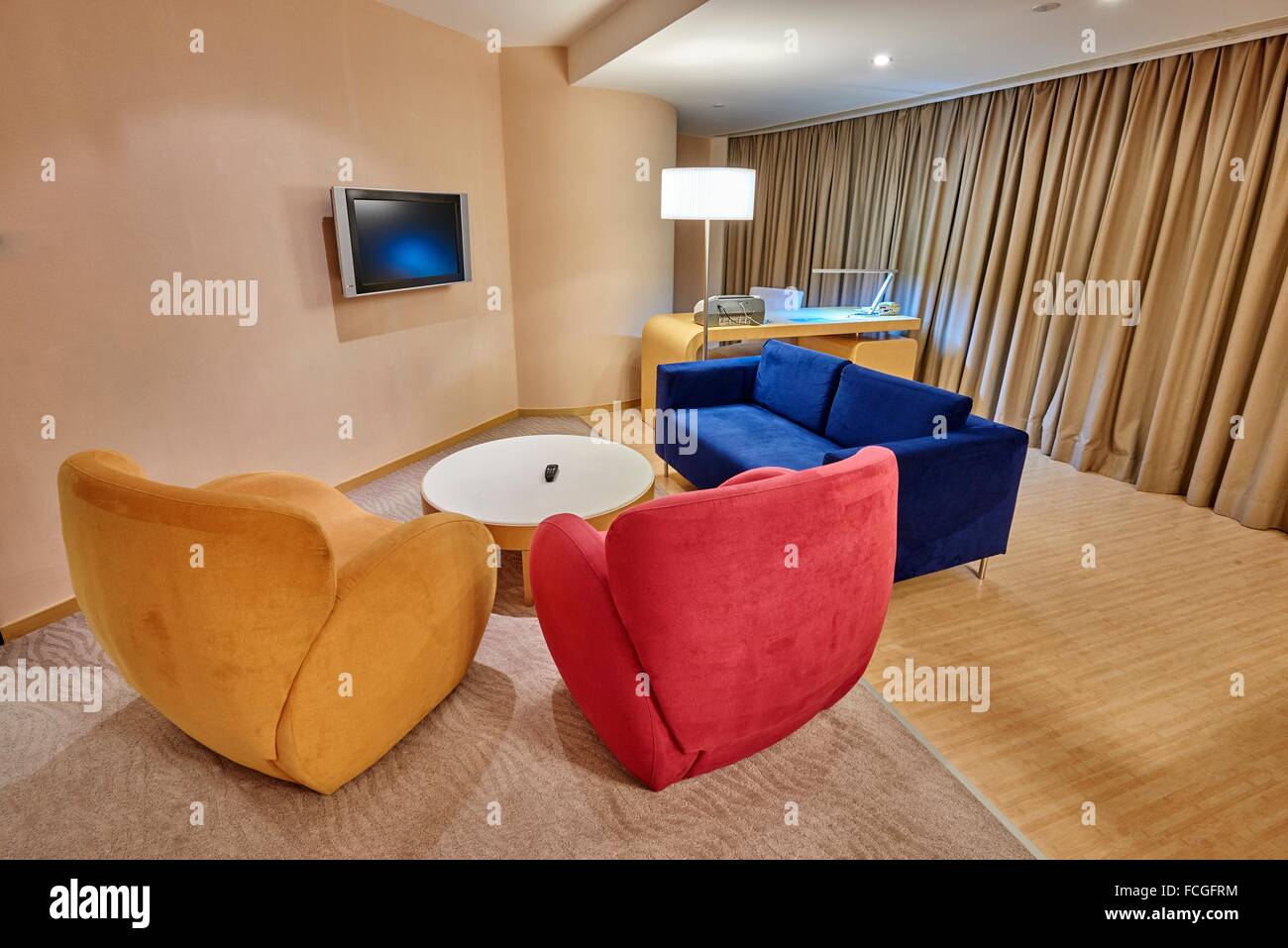 A Contemporary Living Room With Sofa And Working Desk Stock Photo Alamy