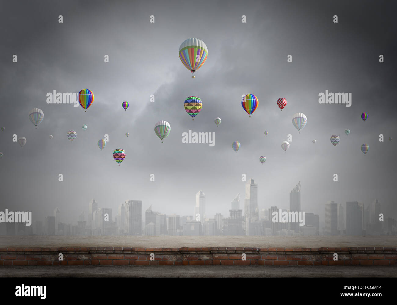 Colorful aerostats flying in clear sky above modern city Stock Photo ...