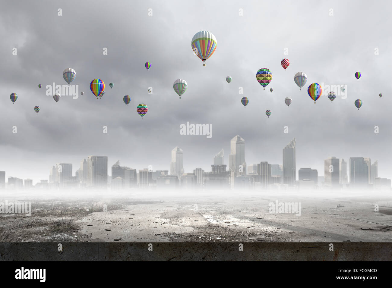 Colorful aerostats flying in clear sky above modern city Stock Photo ...