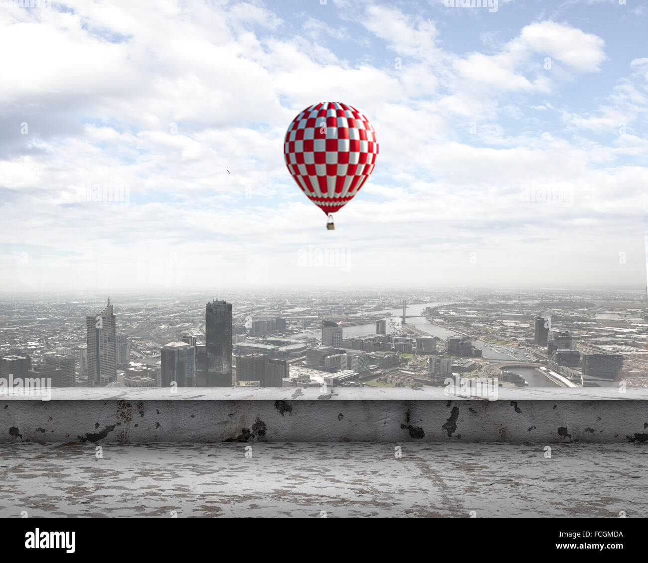 Colorful aerostats flying in clear sky above modern city Stock Photo ...