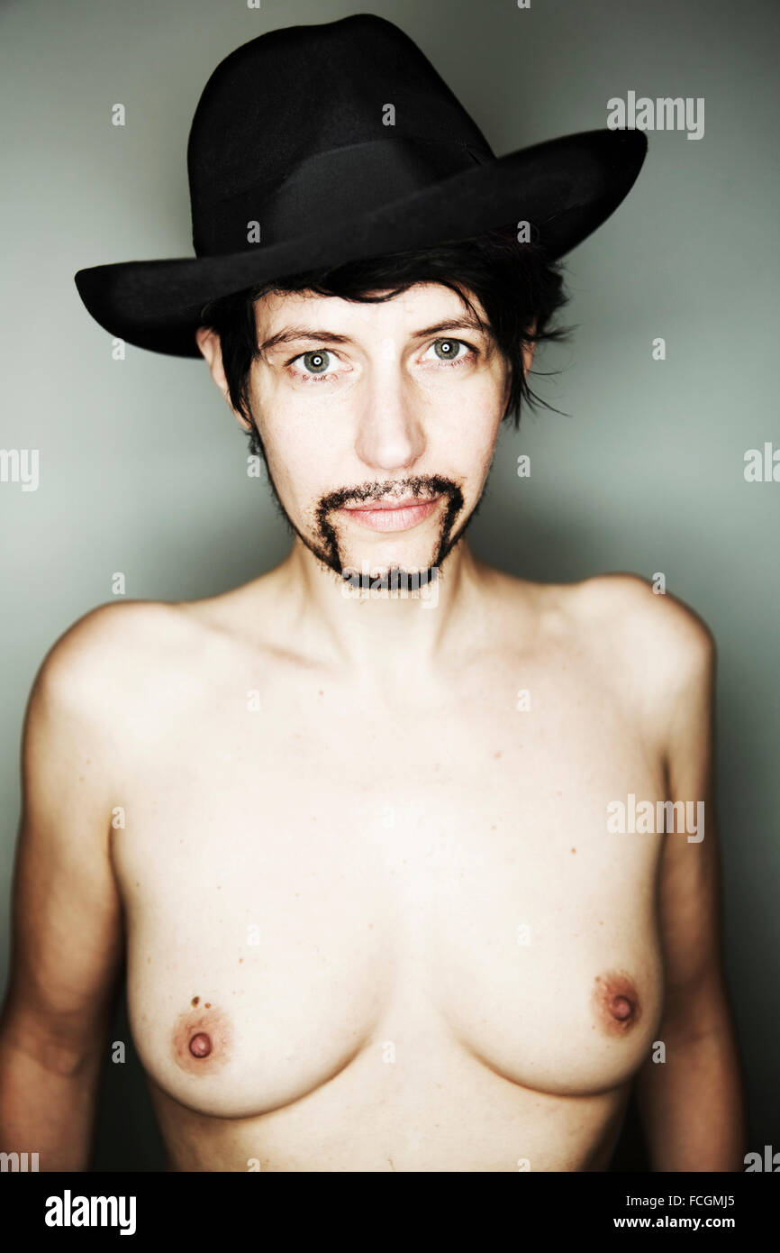 androgynous nude Portrait of naked androgynous woman beard and hat Stock Photo - Alamy
