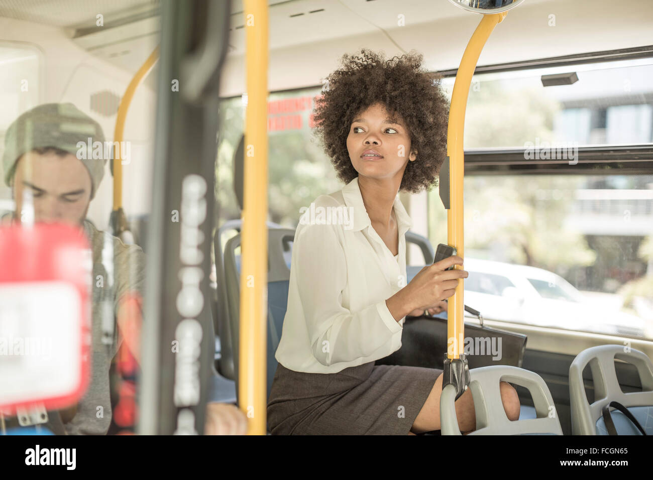 Young black woman on city bus Stock Photo Alamy