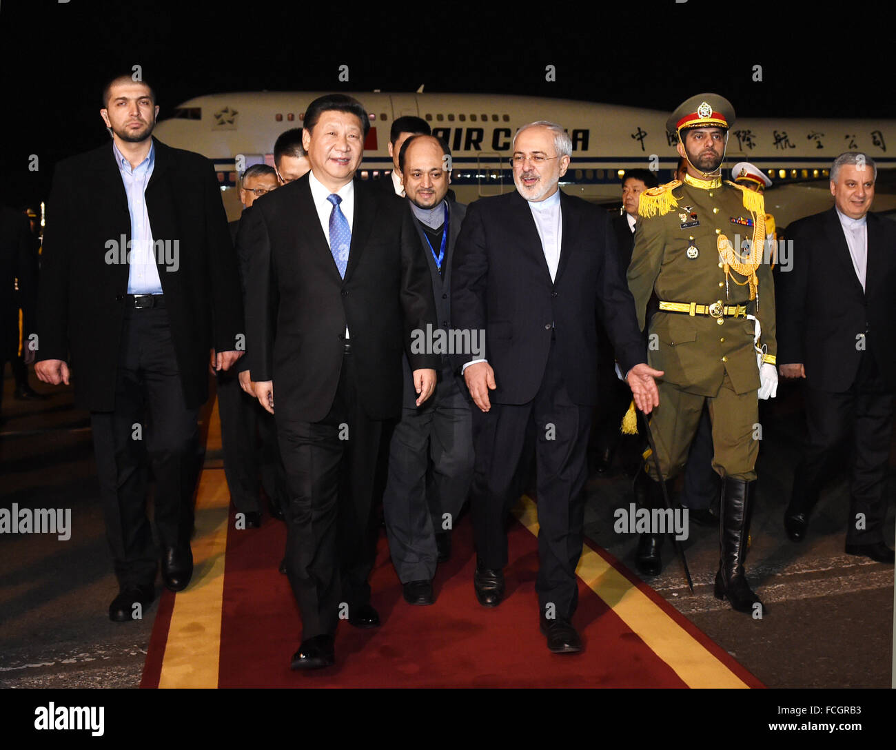Tehran, Iran. 22nd Jan, 2016. Chinese President Xi Jinping (front, L) is welcomed by Iranian Foreign Minister Mohammad Javad Zarif (front, R) in Tehran, Iran, Jan. 22, 2016. Xi Jinping arrived in Tehran Friday night for a state visit to Iran. © Rao Aimin/Xinhua/Alamy Live News Stock Photo