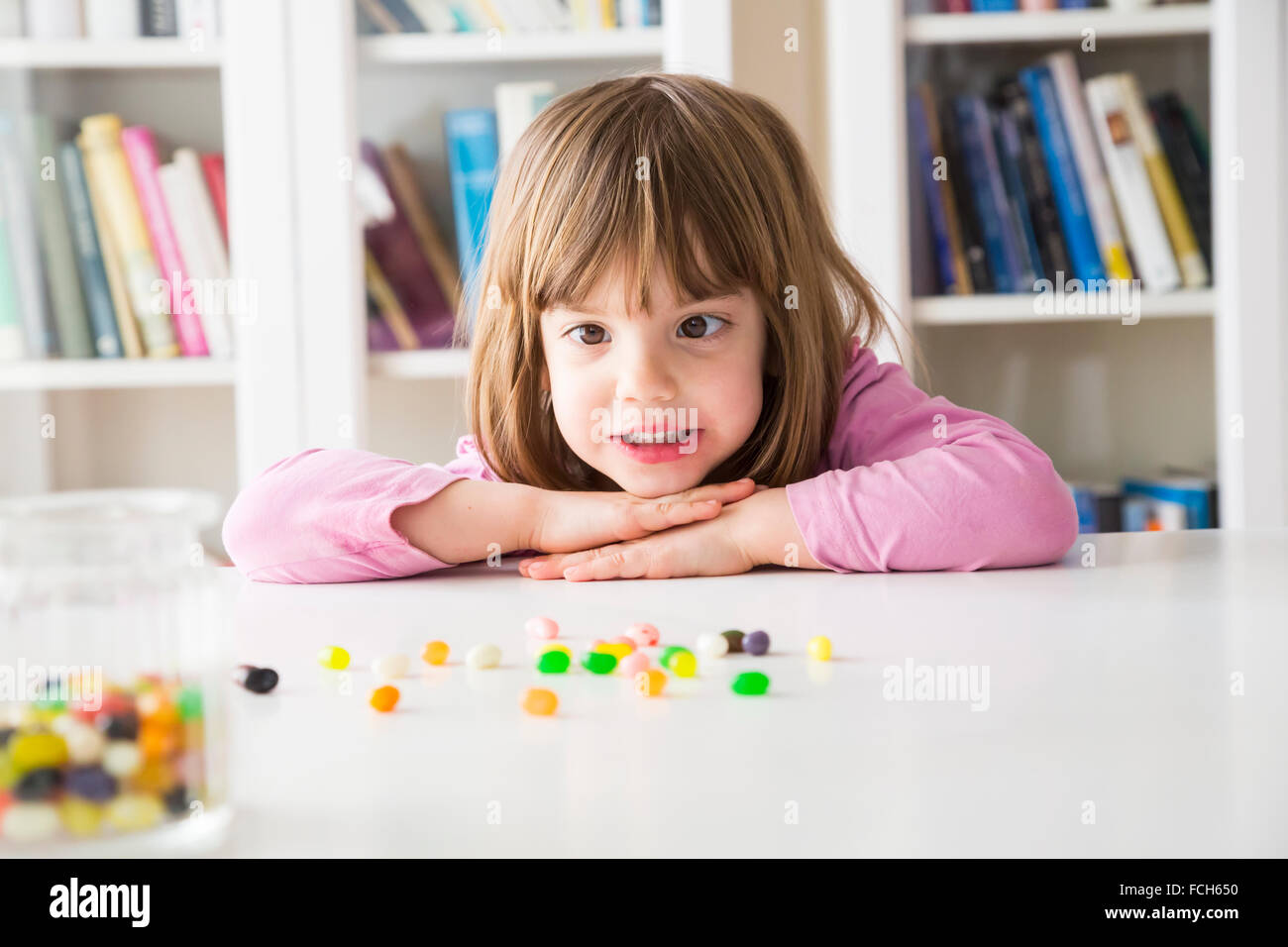 Portrait of little girl jelly beans Stock Photo Alamy