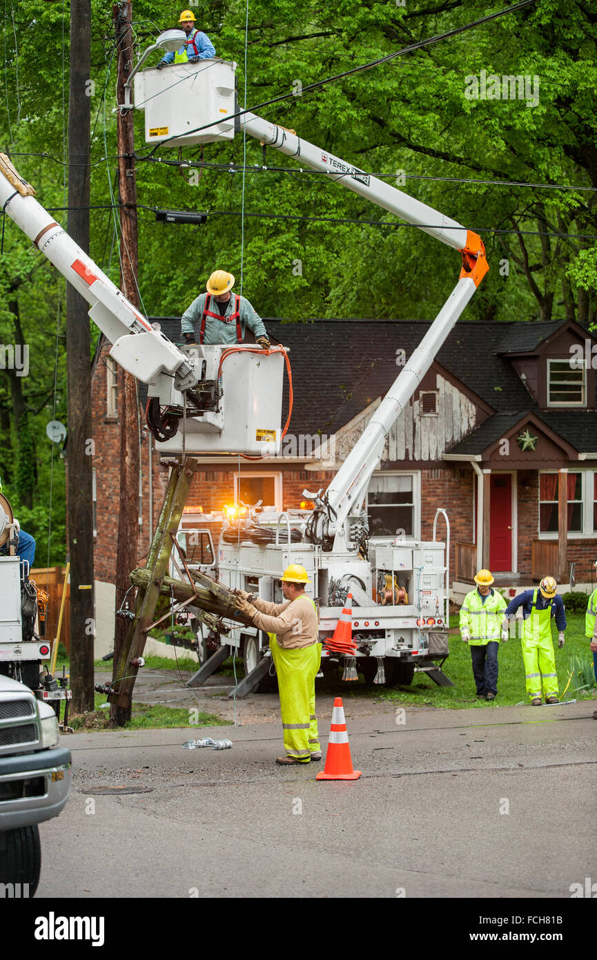 Workers replacing an electrical pole Stock Photo