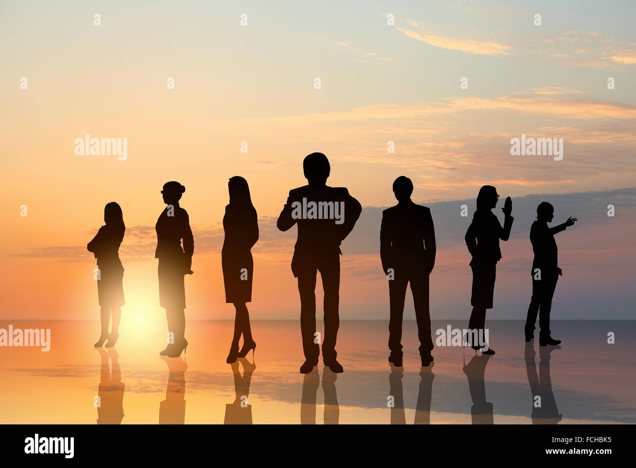 Silhouettes of business people standing in line Stock Photo - Alamy