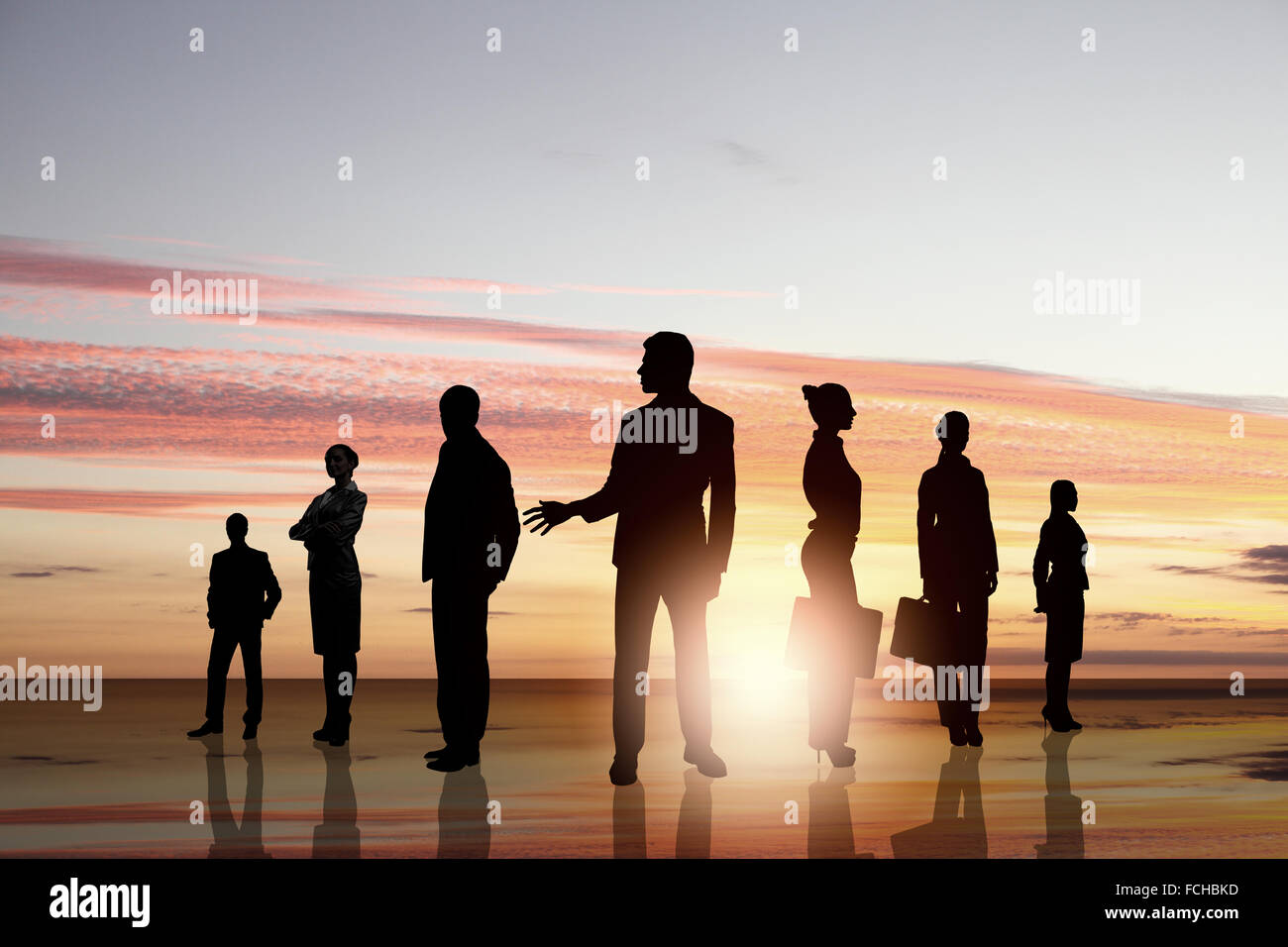 Silhouettes of business people standing in line Stock Photo - Alamy