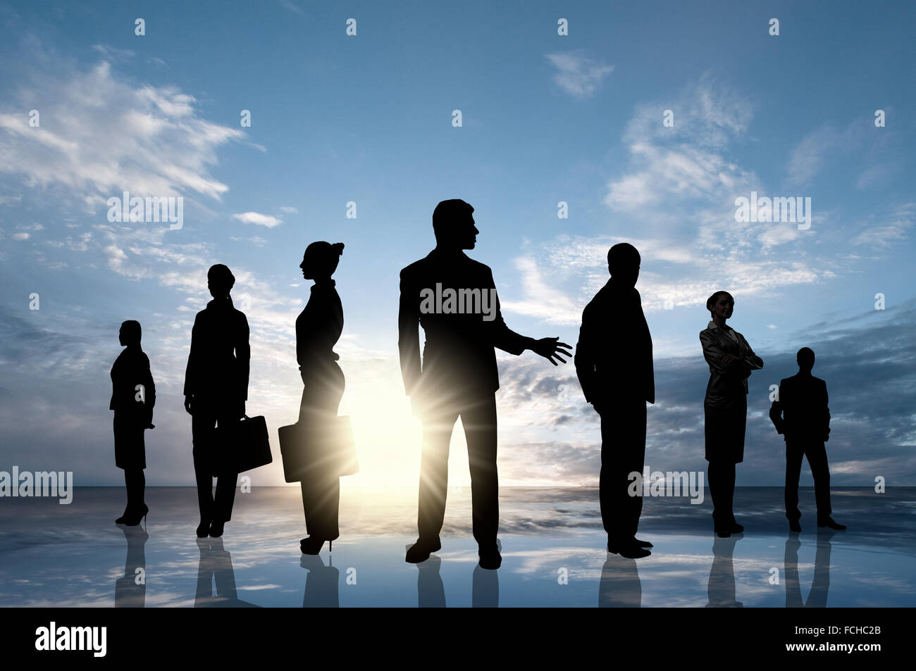 Silhouettes of business people standing in line Stock Photo - Alamy