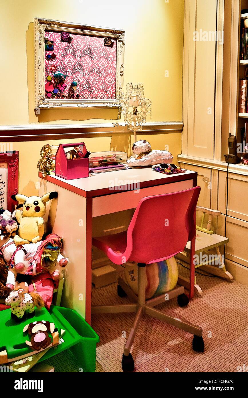 Homework and accessories in a 6 year old little girl´s room. stuffed animal on the side Stock Photo - Alamy