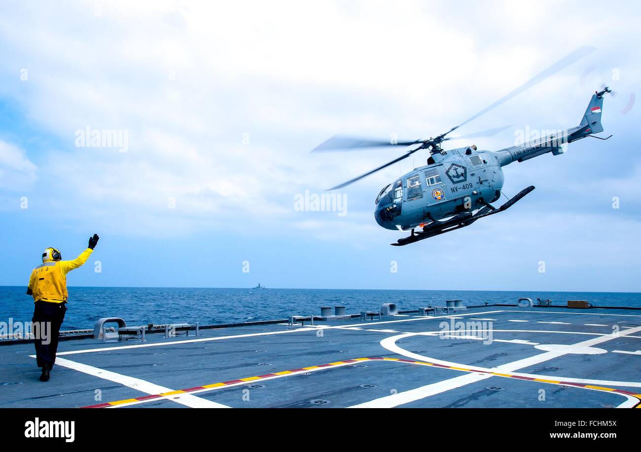JAVA SEA (Aug. 8, 2015) Boatswainâ.s Mate 2nd Class Manuel Gallegos, assigned to the littoral combat ship USS Fort Worth (LCS Stock Photo
