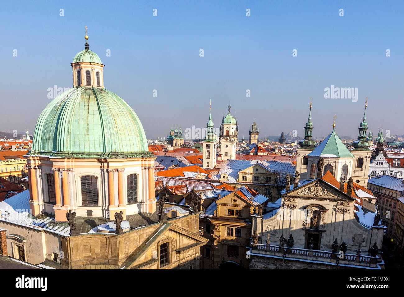 Towers and rooftops of Old Town, the dome of St. Francis of Assisi Church, Prague, Czech Republic Stock Photo