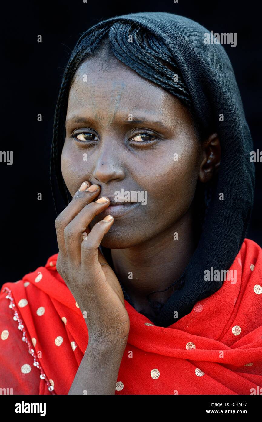 Head portrait of Afar tribe woman with facial scarifications and ...