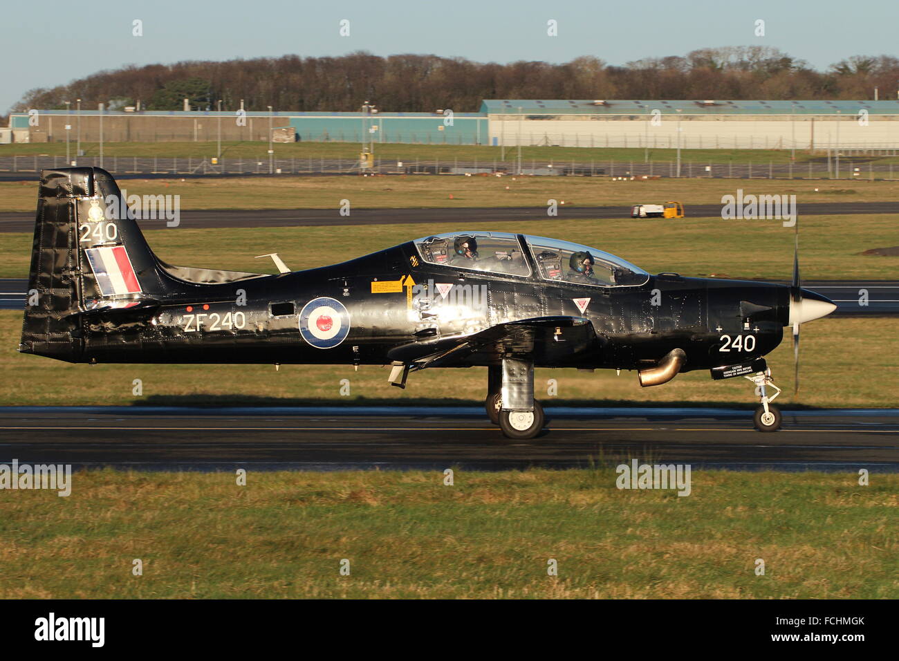 ZF240, a Shorts Tucano T1 of the RAF taxis out at Prestwick International Airport, after a brief visit. Stock Photo