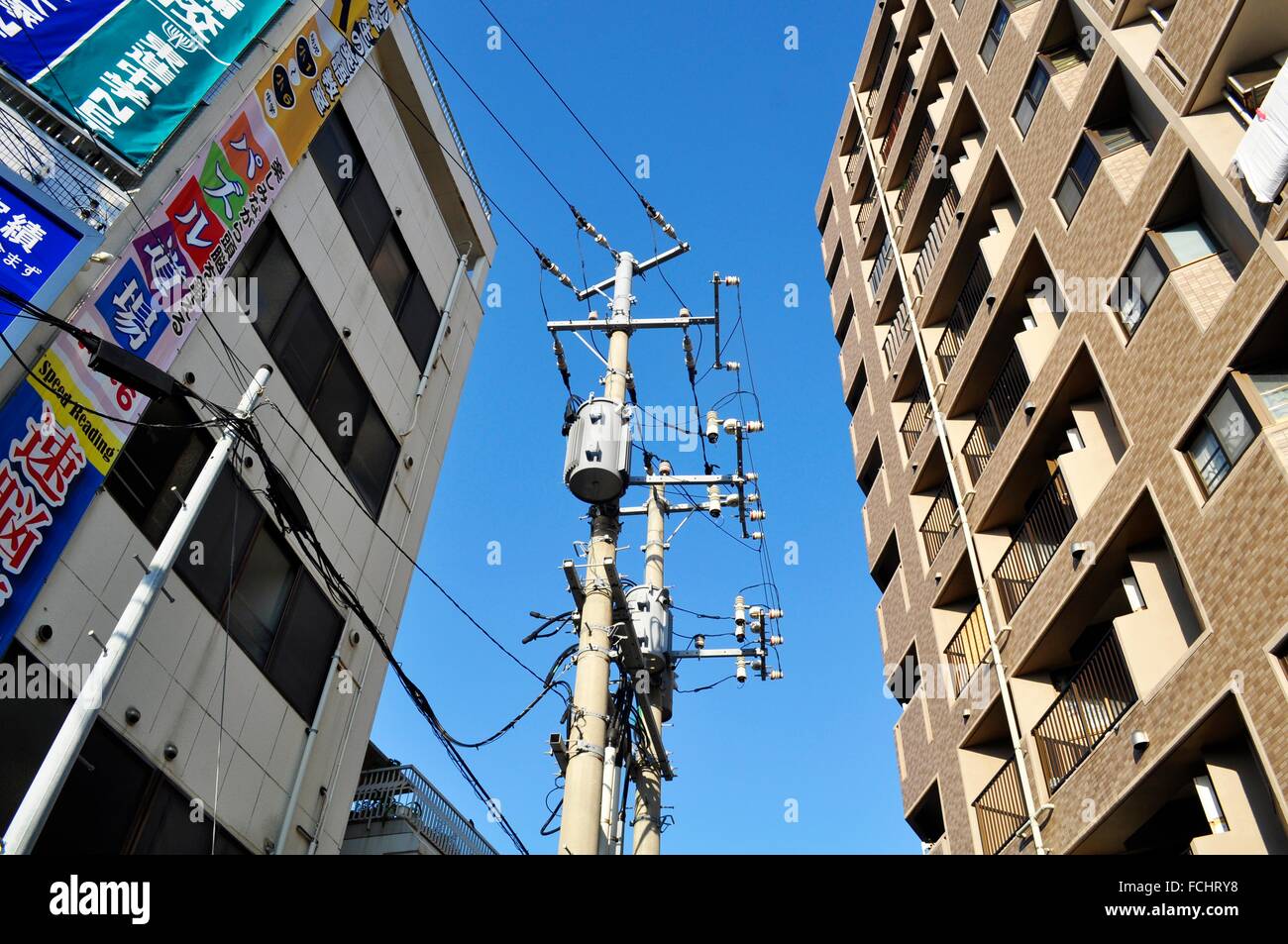 Naha, Okinawa, Japan electricity poles and wires too near to