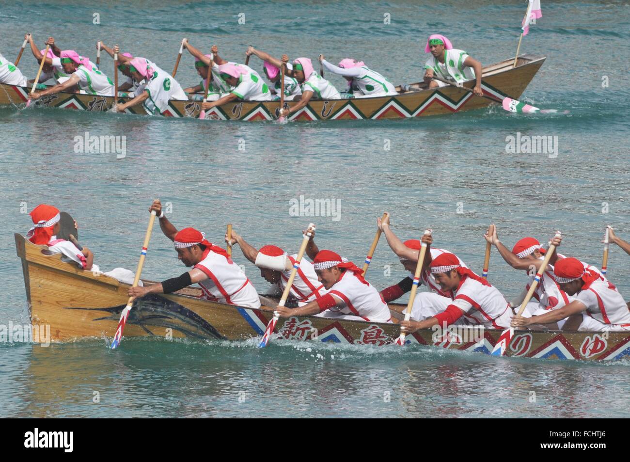 Itoman, Okinawa, Japan canoes during the traditional Haarii Boat
