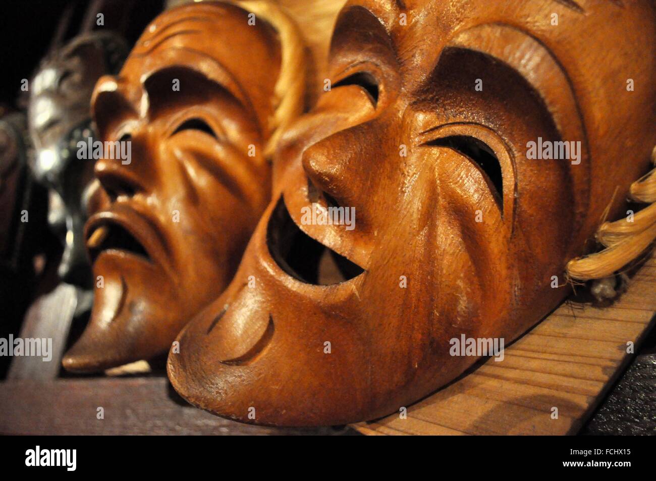 Naha, Okinawa, Japan wooden masks in a restaurant at Sakaemachi Market
