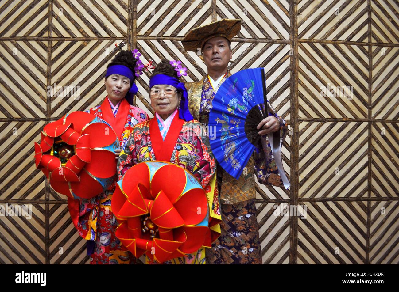 Naha, Okinawa, Japan tourists dressed in traditional Ryukyan dresses