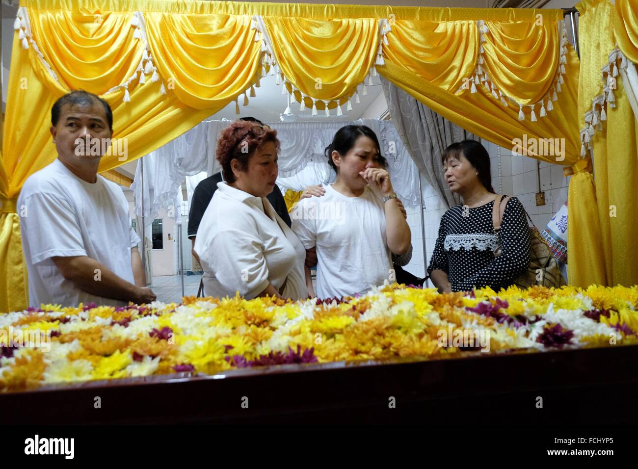 Widow grieving the death of her husband. Sarawakian chinese funeral ceremony. Malaysia Stock
