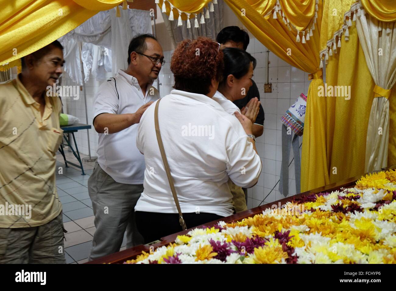 Widow grieving the death of her husband. Sarawakian chinese funeral ceremony. Malaysia Stock