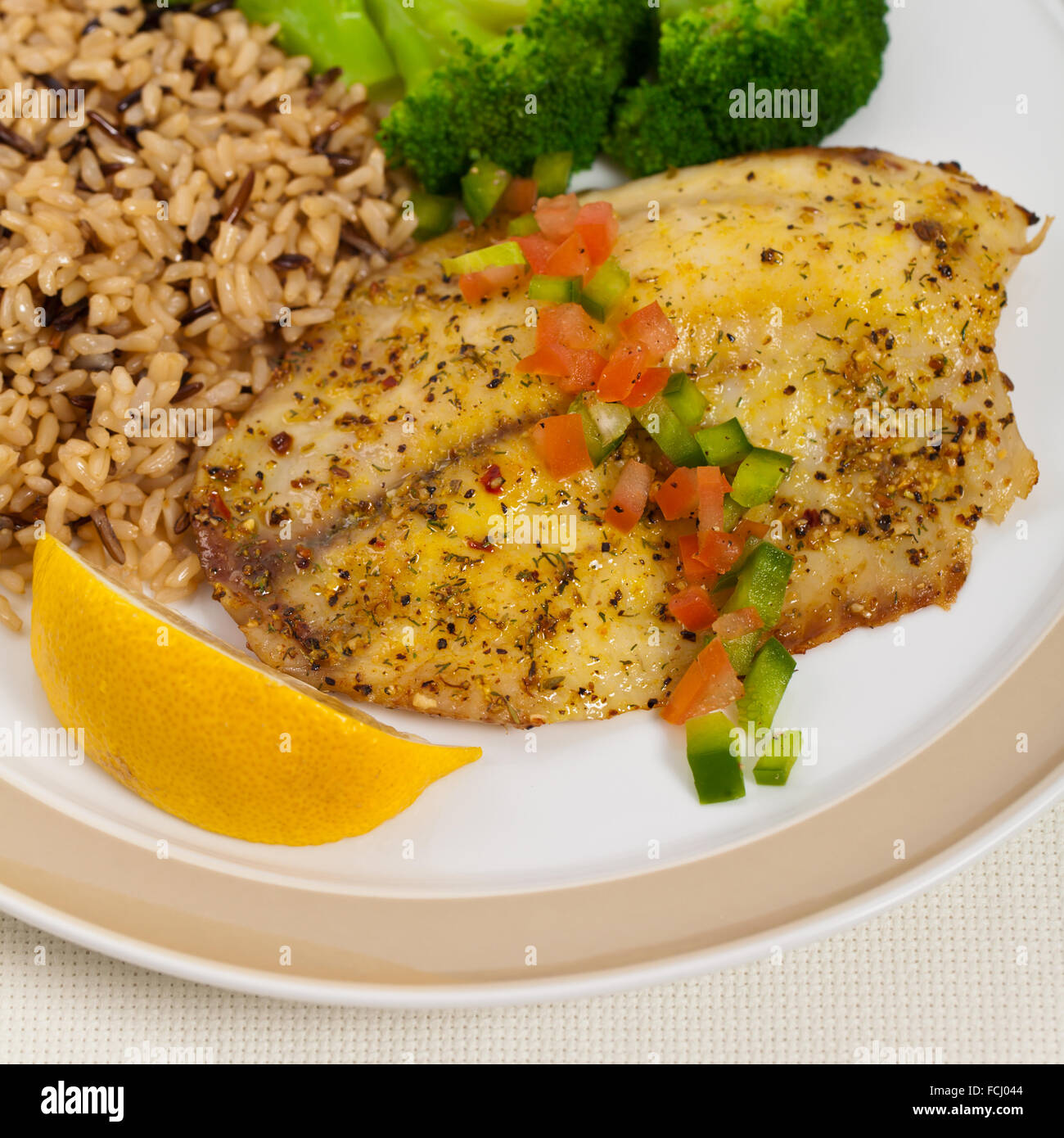 Baked Tilapia Fish Fillet Stock Photo Alamy