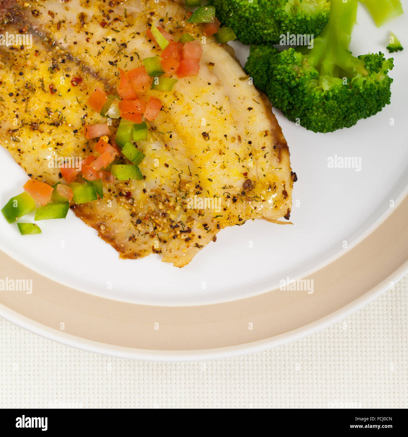 Baked Tilapia Fish Fillet Stock Photo - Alamy