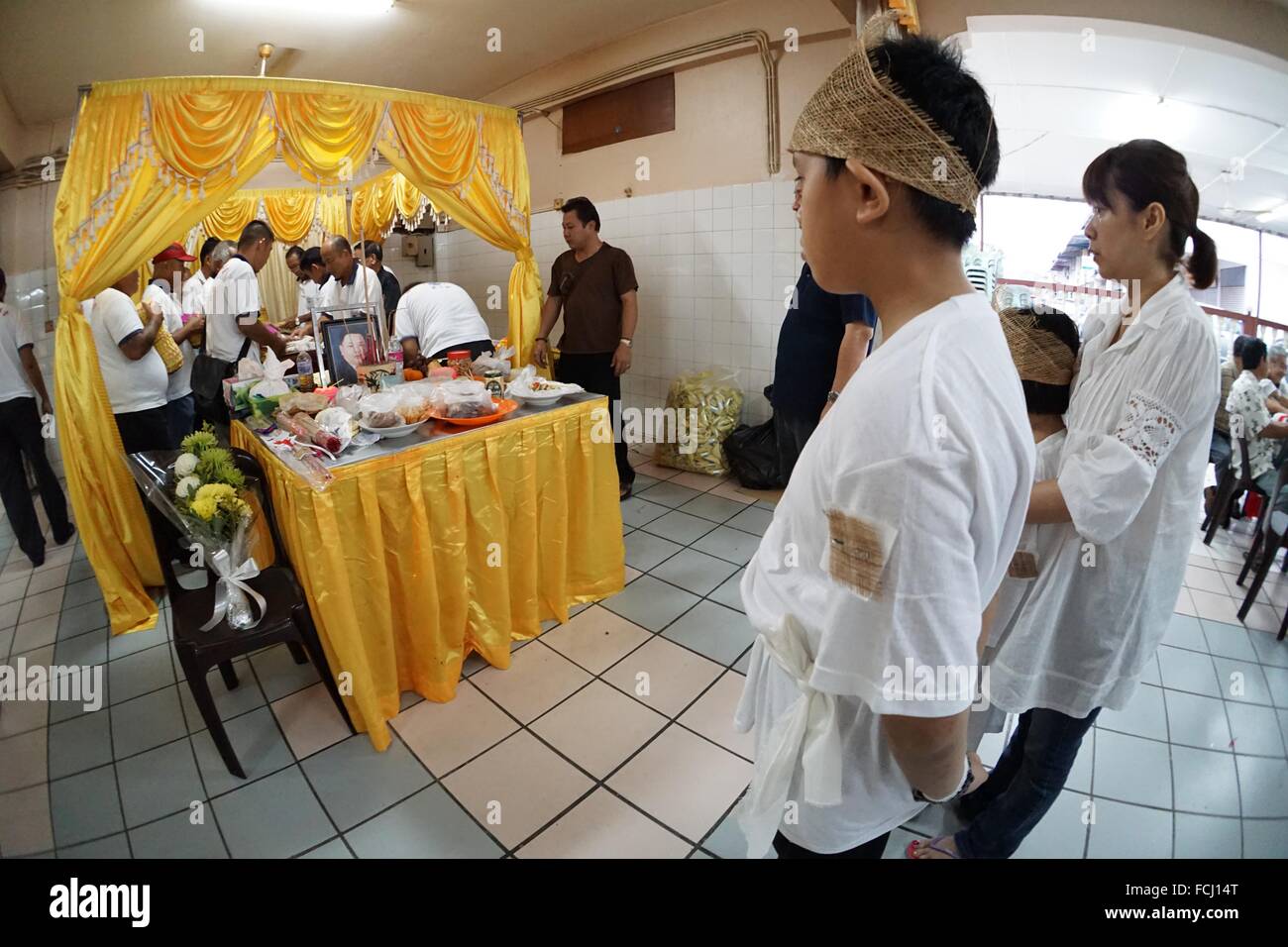 The eldest son paying his last respect. Sarawakian chinese funeral ceremony. Malaysia Stock