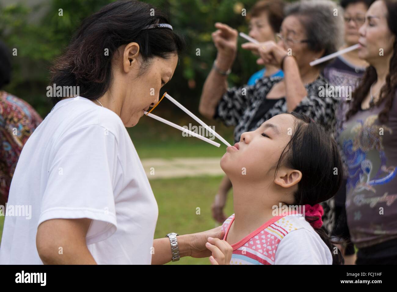 Adult game played by child hires stock photography and images Alamy