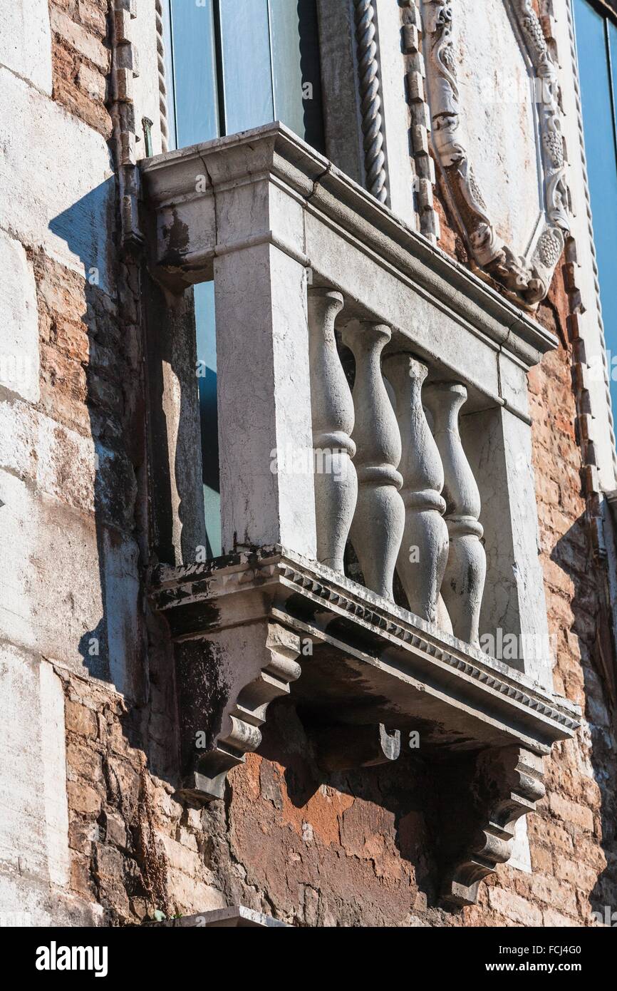 Close up of a decayed building and balcony in Venice, Italy, Europe Stock Photo