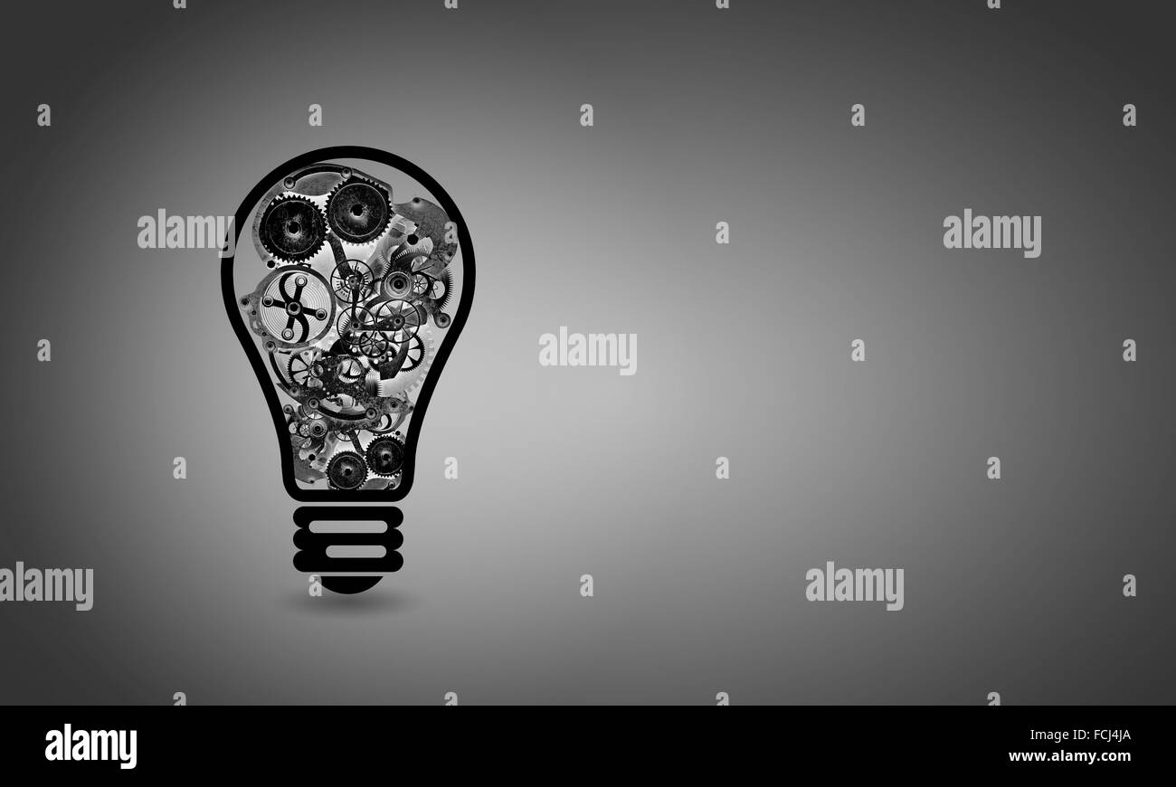 Conceptual image with light bulb filled with gears Stock Photo Alamy
