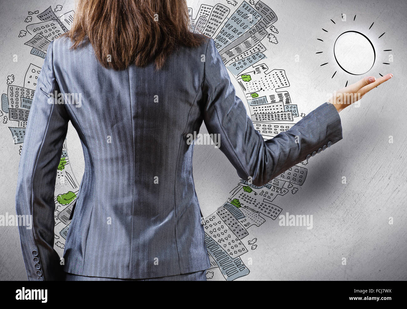 Rear view of businesswoman and sketches at background Stock Photo - Alamy