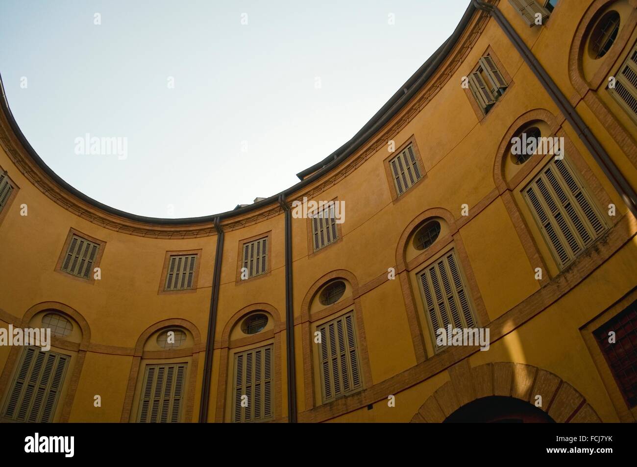 Municipal theatre comunale 'Riccardo Muti' elliptical shape seen from its inner square in Ferrara - Italy. Stock Photo