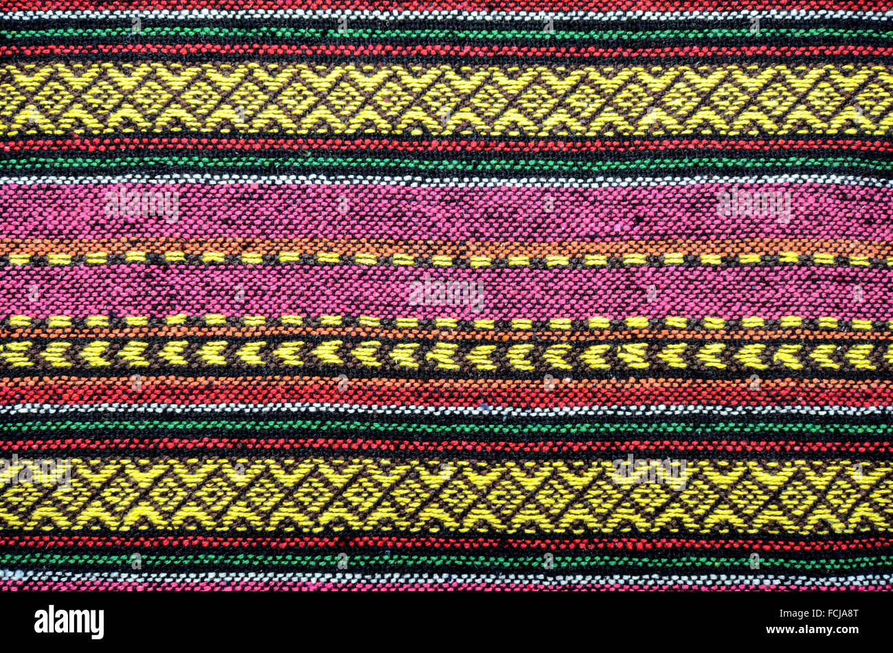 Tribal handmade woven cotton fabrics form Chiengmai, Thailand. Pattern for design element. Stock Photo