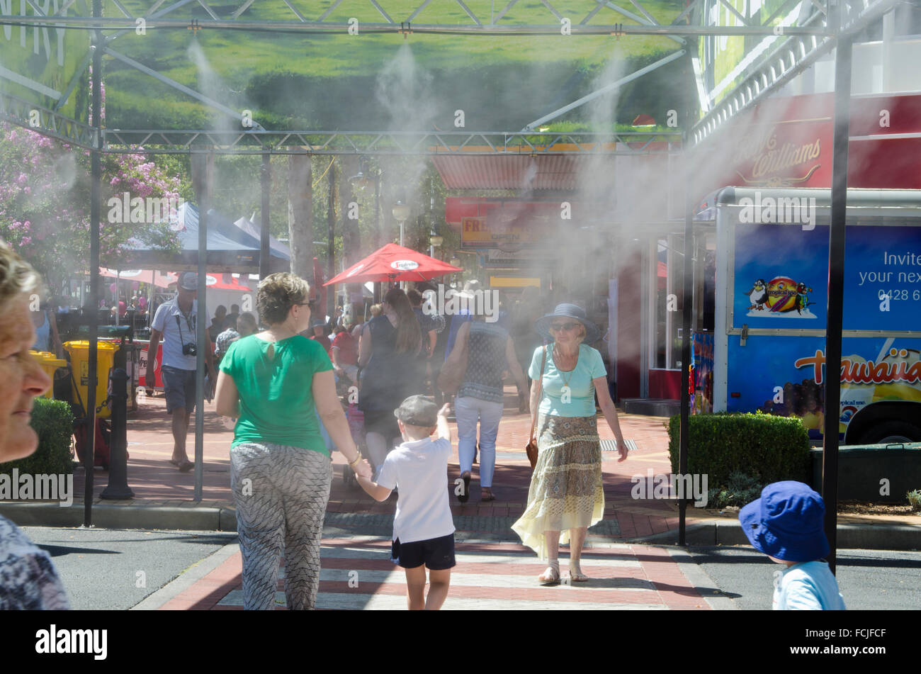 People walking through hydration cooling area at Tamworth Country Music Festival Stock Photo