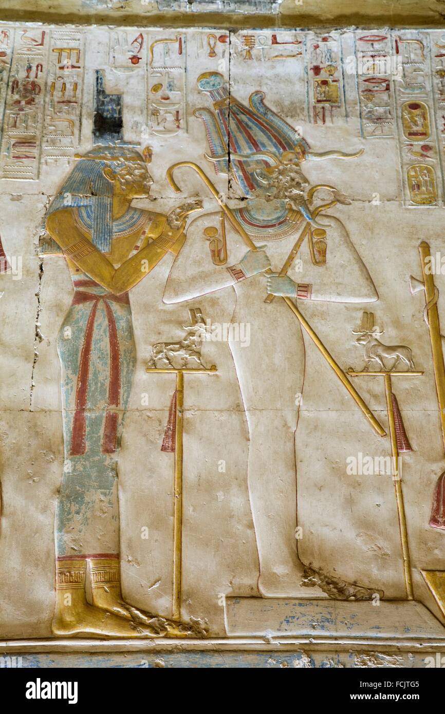 Bas-relief, God Khnum (right), Temple of Seti I, Abydos, Egypt Stock Photo